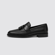 Black woven tassel loafer side profile