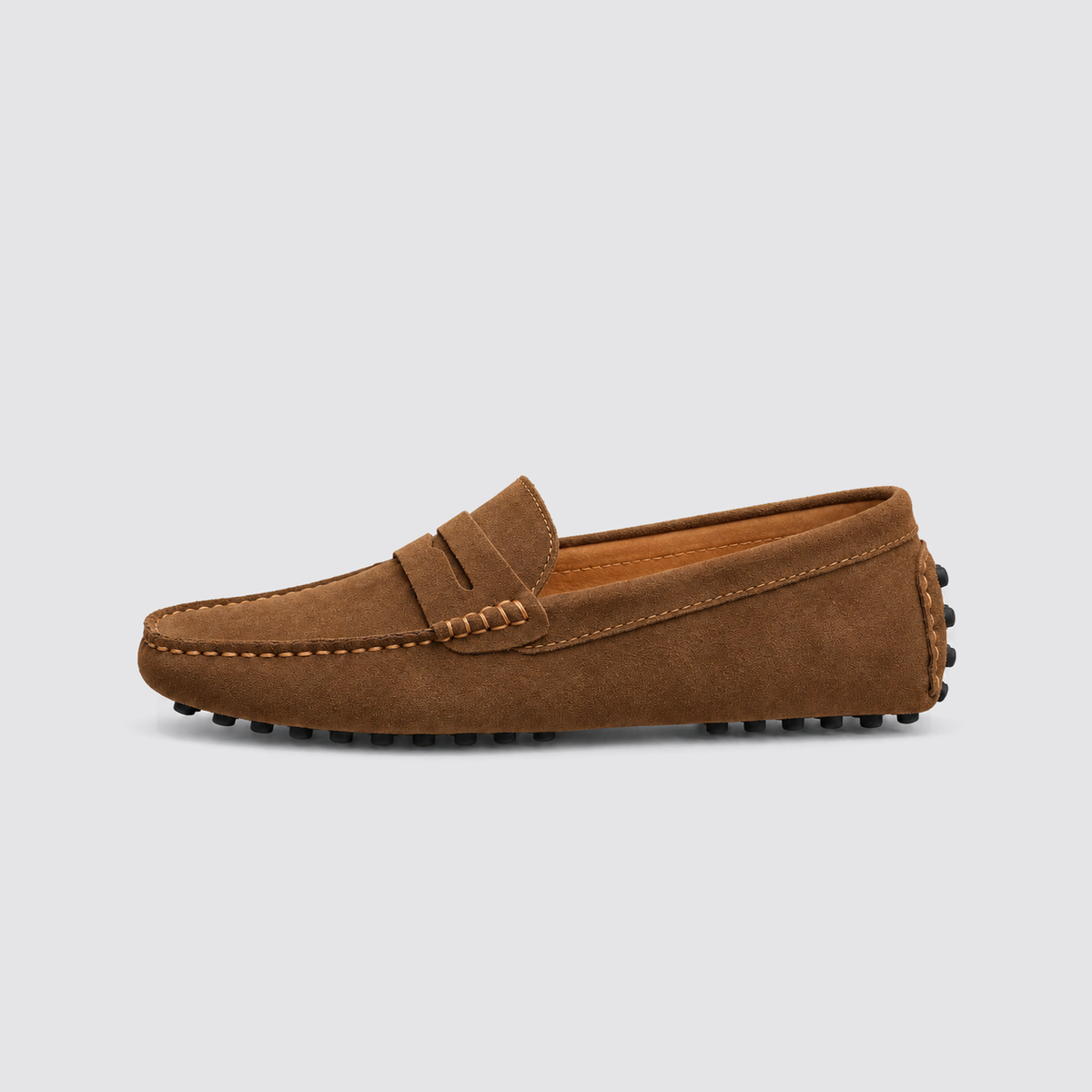 Brown loafer, side view, background #e5e5e7