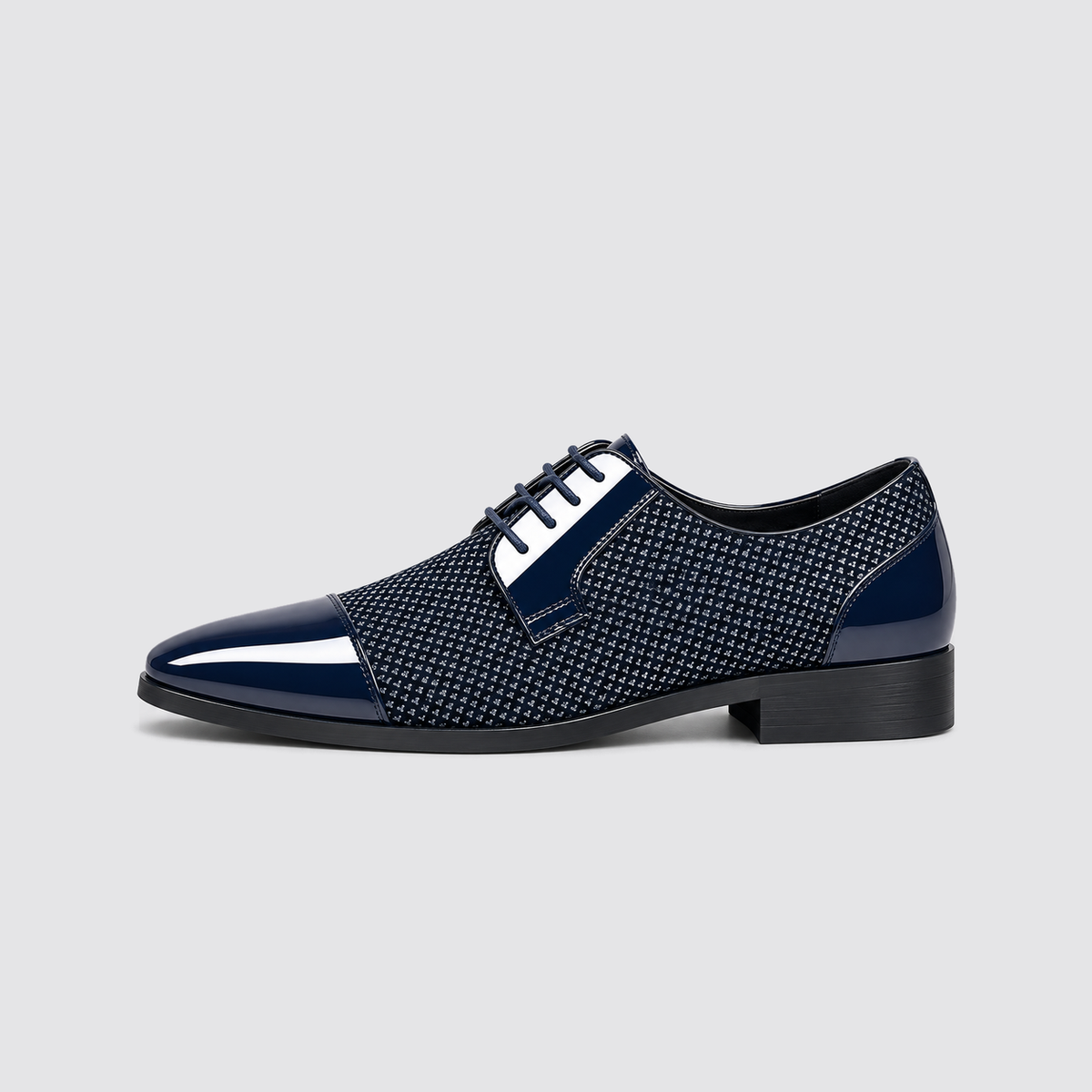 Blue patent dress shoe side profile