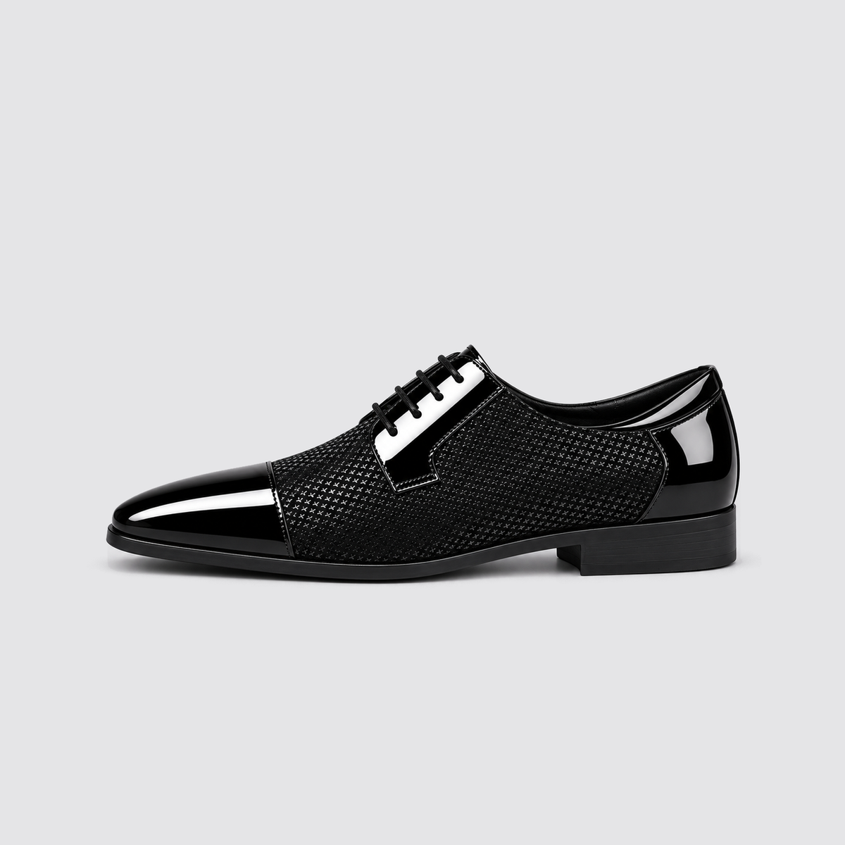 Black patent dress shoe side profile