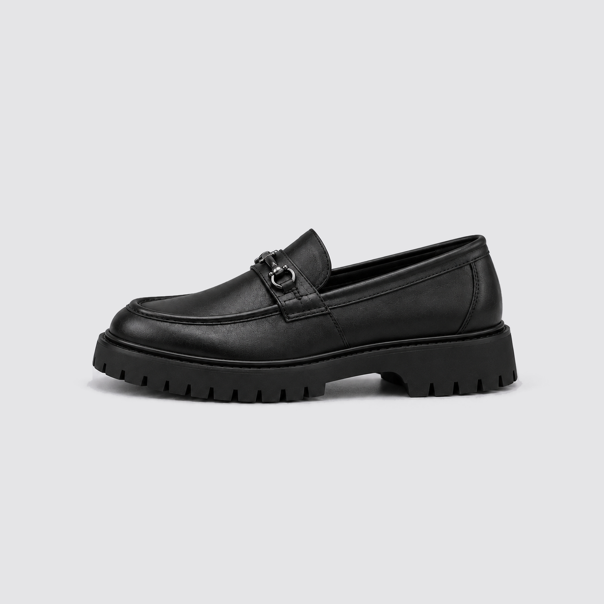 Matt Black shoe, side view, background #e5e5e7